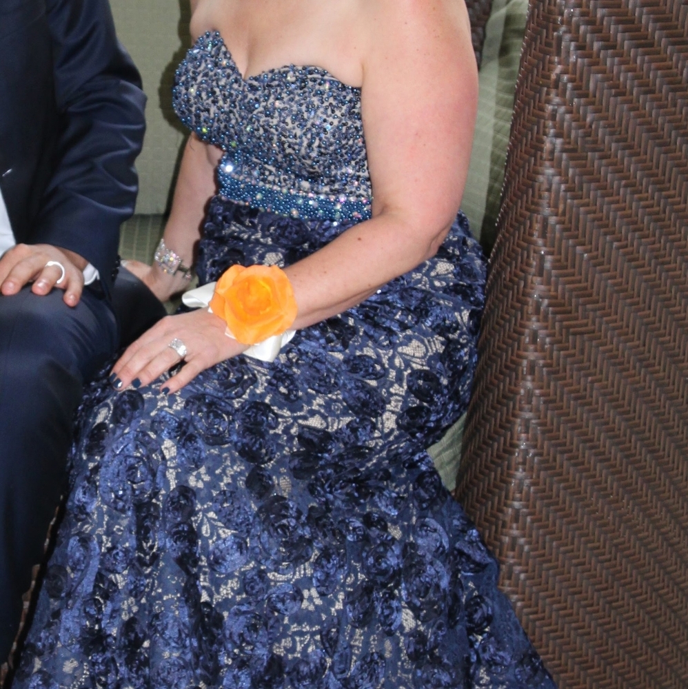 Jovani couture formal navy dress with a short train